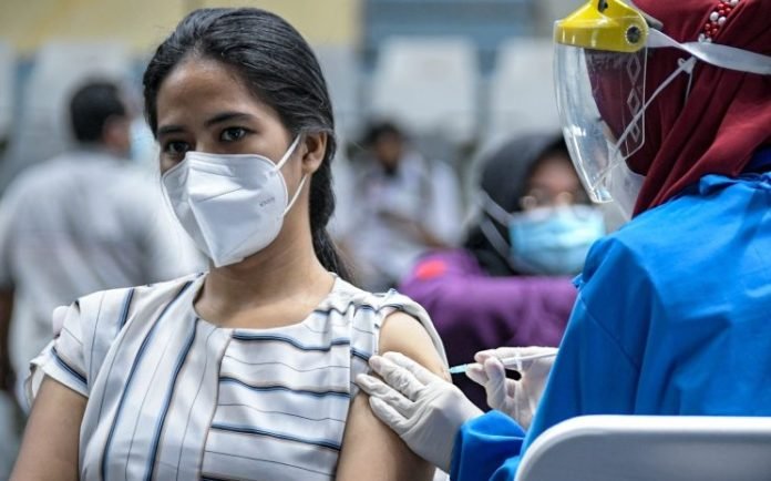  Waspada! Pandemi Belum Usai: Upaya Masyarakat Indonesia Menghadapi Lonjakan Kasus COVID-19 Global 