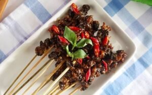 Sate Kolombi: Sajian Ekstrem Khas Manado yang Bikin Lidah Bergoyang